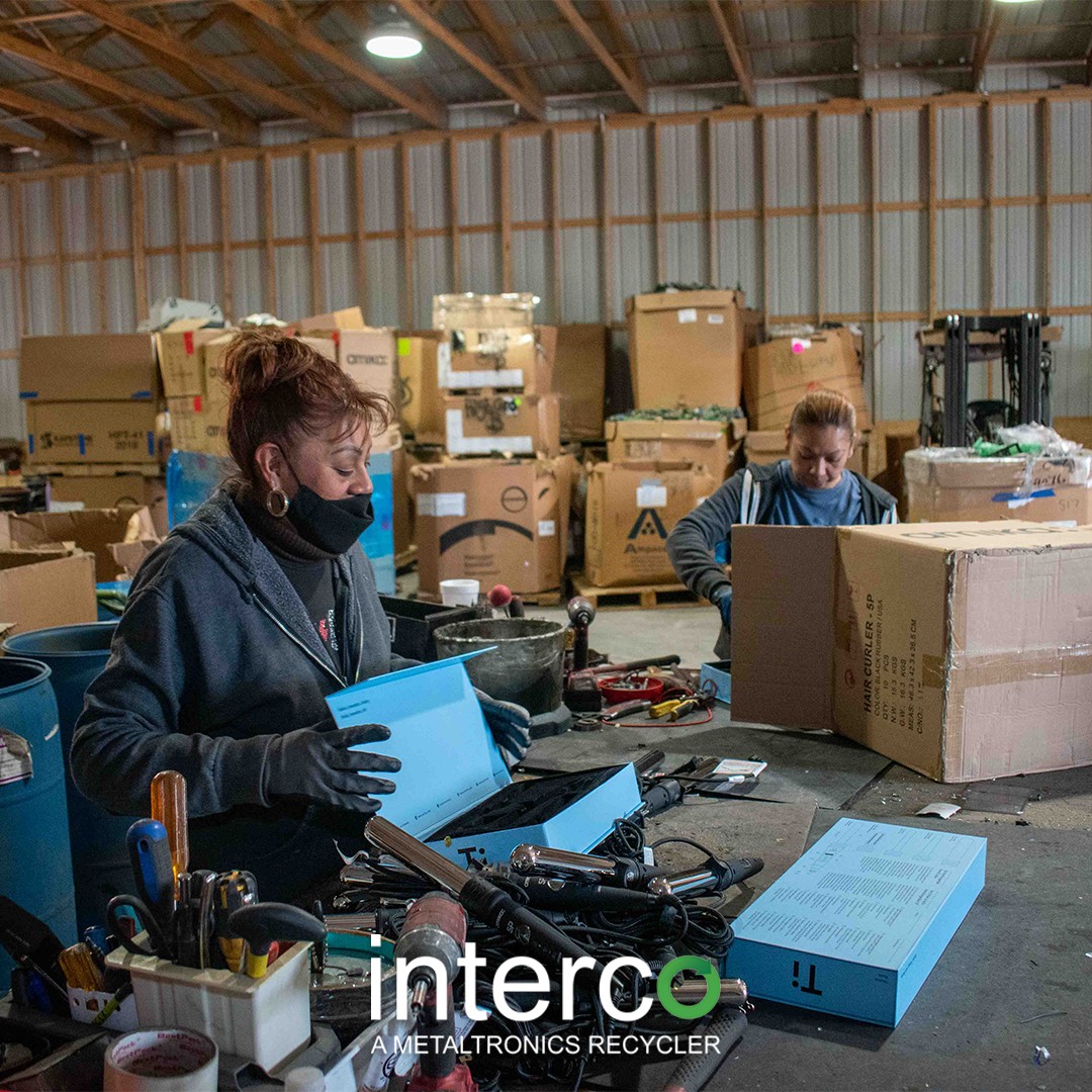 Individuals working in a warehouse environment